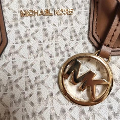 michael kors metal logo